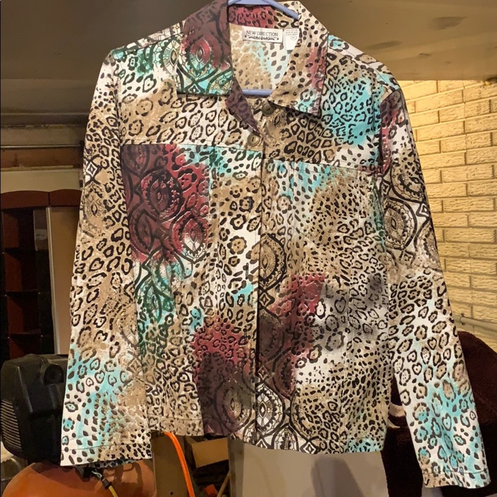 Women’s button down long sleeve shirt.